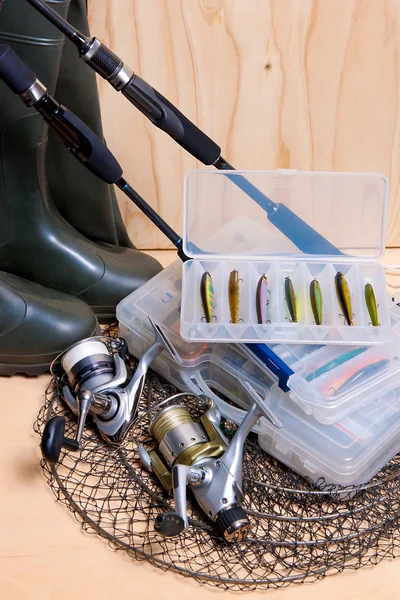 stock image Fishing rod and reel with box for baits.