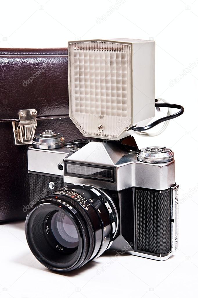 Retro camera with flash isolated on white on the white backgroun