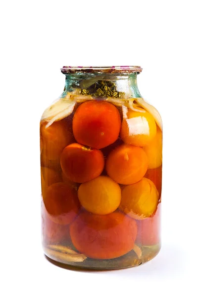 Glass jar of canned tomatoes on white background. — Stock Photo, Image