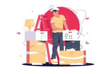 Taşındıktan sonra kutuları açan adam