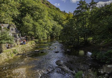 Fingle Bridge is a picturesque valley on the River Teign on Dartmoor clipart