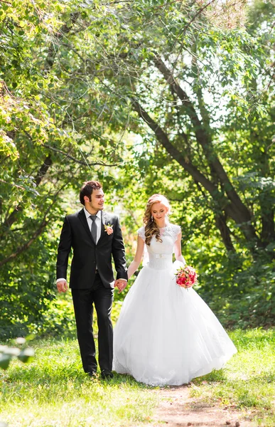 Romantic wedding couple having fun together outdoor in nature — Stock Photo, Image