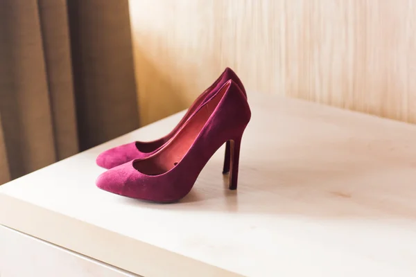 Crimson shoes on high heels — стоковое фото