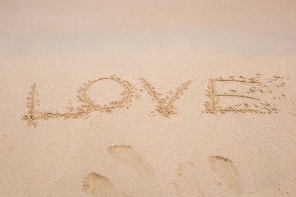 Word love on sand — Stock Photo, Image