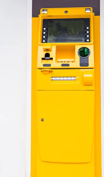 yellow ATM machine