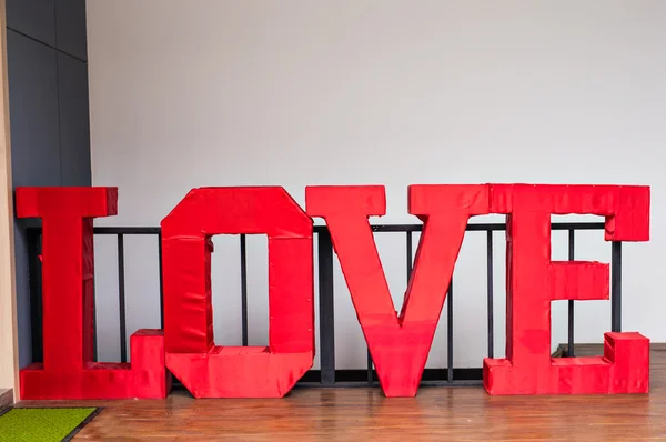 Creative big word LOVE on floor — Stock Photo, Image