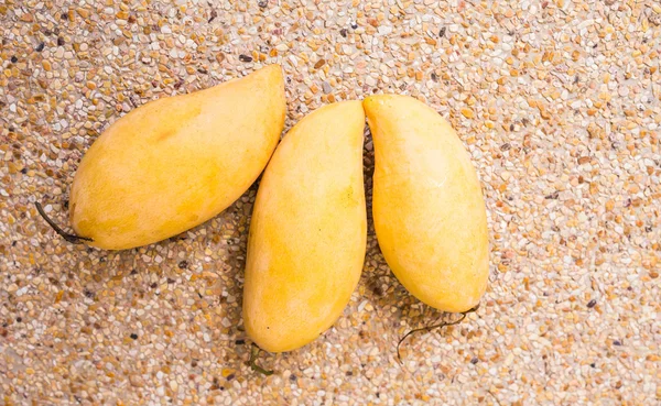 Fruits, diet and healthy food concept - close up of mango — Stock Photo, Image