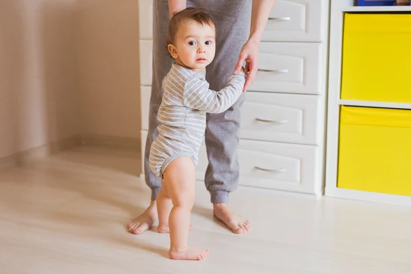 First steps of cute baby boy — Stock Photo, Image