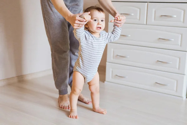 First steps of cute baby boy — Stock Photo, Image