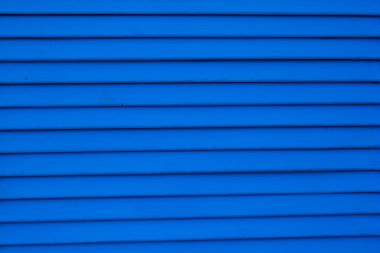 metal kapı olarak mavi kepenkli topla