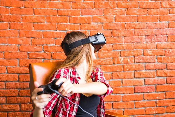 Woman play the video game with virtual reality device