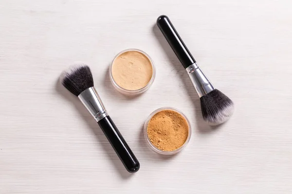 Mineral face powder and brush. Eco-friendly and organic beauty products