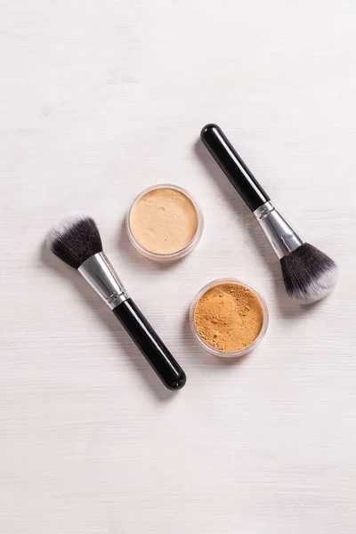 Mineral face powder and brush. Eco-friendly and organic beauty products