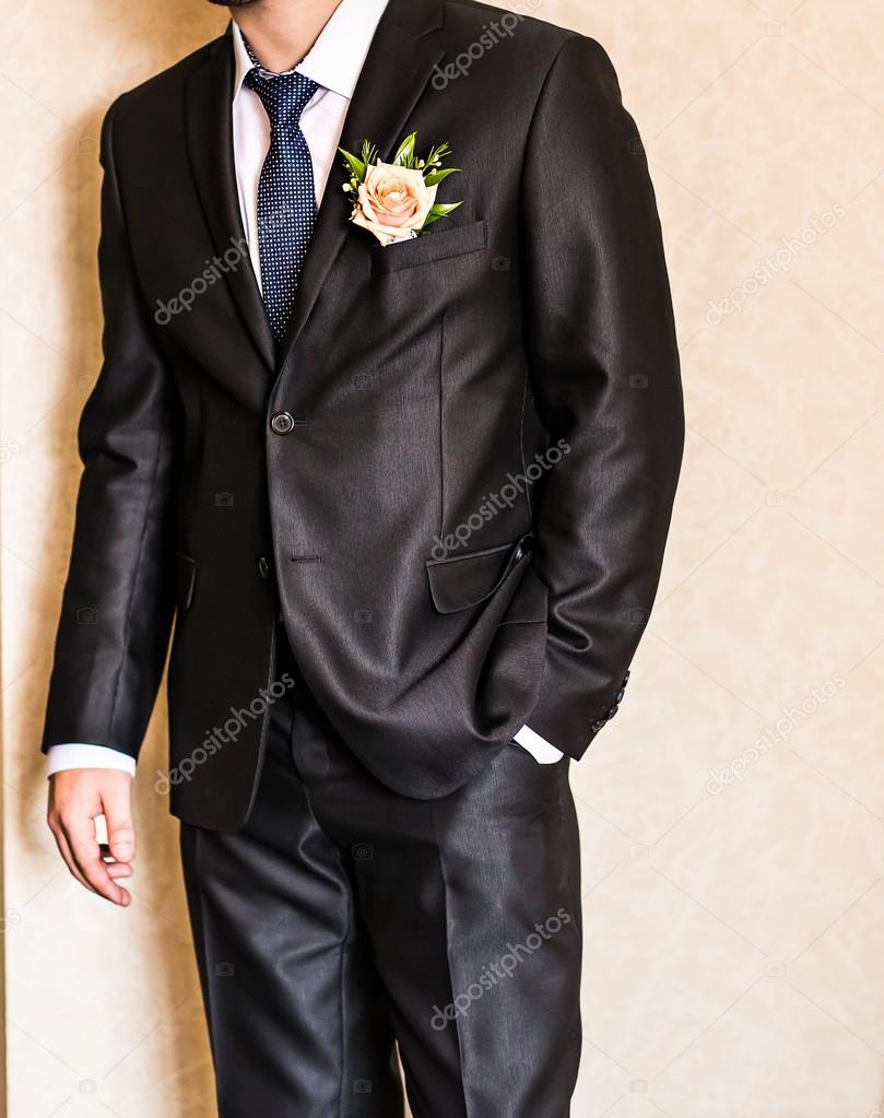 man in a suit with boutonniere