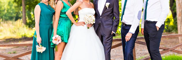 Groom and bride with friends — Stock Photo, Image