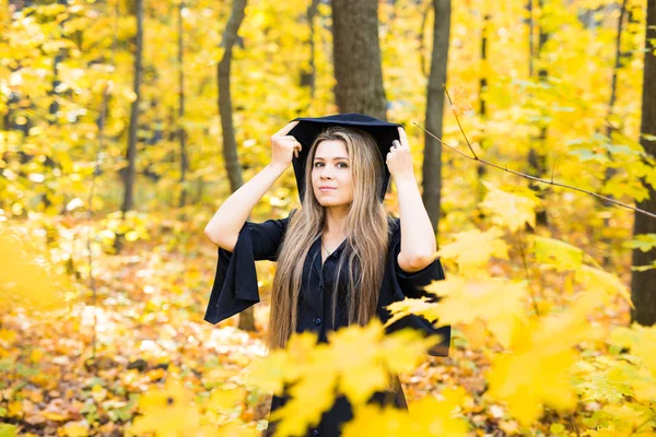 Portrait of beautiful blond young woman in forest. Halloween day — Stock Photo, Image