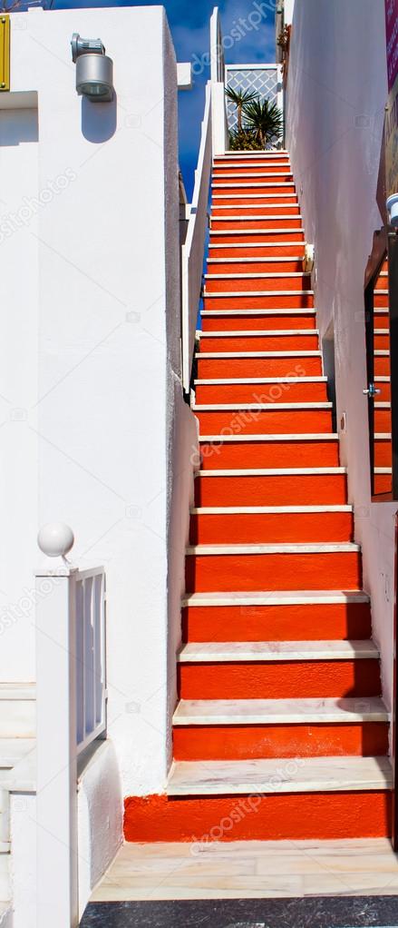 Beautiful old unique steps and Aegean sea in Oia, Santorini, Greece