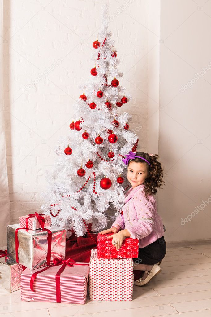Happy child with Christmas gift box