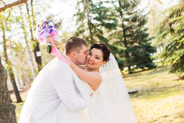 Wedding couple hugging Stock Photo