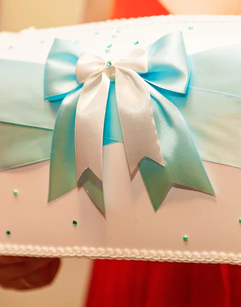 Turquoise blue ribbon bow for packaging. — Stock Photo, Image