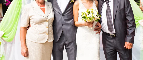 The bride and groom, and guests — Stock Photo, Image