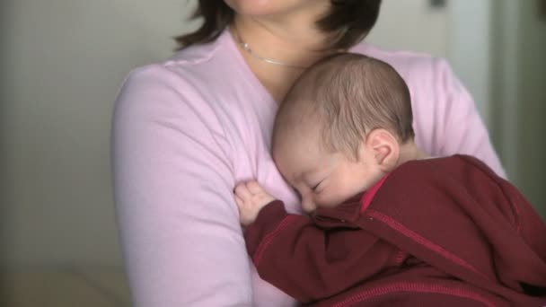 Mother holding her infant — Stock Video