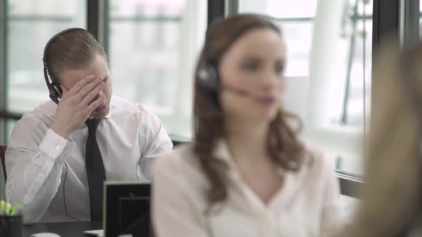 Scene from a customer support or call center — Stock Video