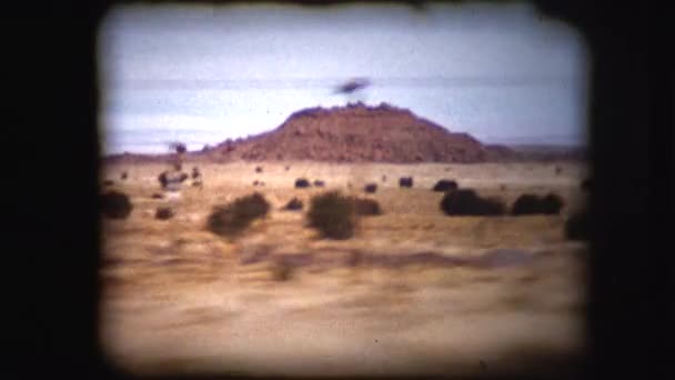 Vintage 8mm footage film through the window of a car — Stock Video