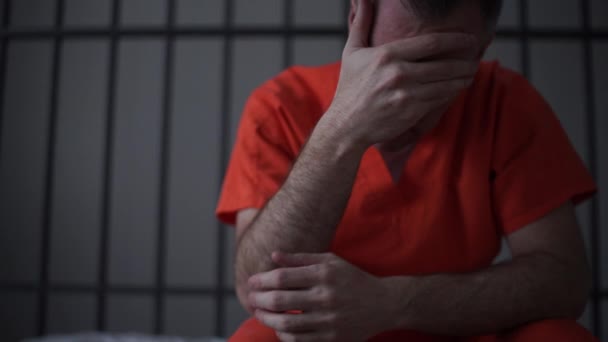 Scene of a depressed inmate in prison — Stock Video