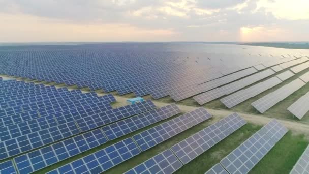 Aerial top drone shot of large solar power station with big quantity of sun panels. Concept of renewable and alternative energy, future technology. — Stock Video