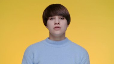 Caucasian woman making facepalm gesture while feeling bored