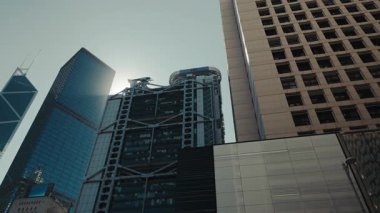 HONG KONG, CHINA - MAY 19 2025: HSBC Main Building stylish exterior design in Hong Kong block at sunset. Headquarters of Hong Kong and Shanghai Banking Corporation location in megapolis. Business life