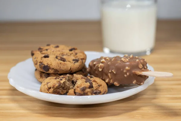 Chocolate Chip Cookies Ice Cream Stick Chocolate Almonds Glass Milk — Stock Photo, Image