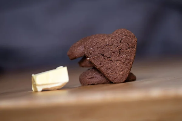 Heart Shaped Chocolate Cookies Margarine Cub Side Standing Wooden Table — Stock Photo, Image