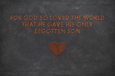 Christian Motivational quote saying For God so loved the world that he gave his only begotten Son on rough black background stock photo JPG file clipart