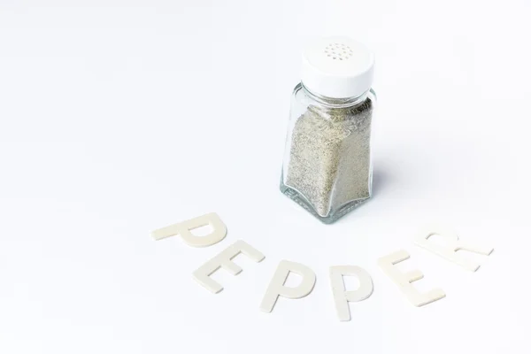 Image of a small pepper shaker isolated on a white background — Stock Photo, Image