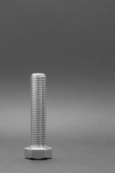 Screw bolt isolated on a black background