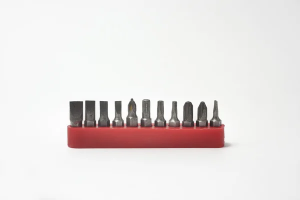 Set of steel screwdrivers with tools on a white background — Stock Photo, Image