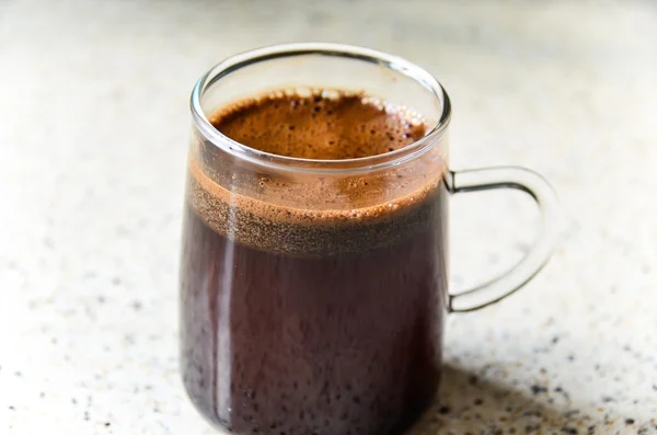 Un vaso de café negro — Foto de Stock