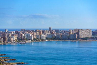 San Juan Alicante on a sunny day. Calm sea, good weather, not crowded. Cityscape. Costa Blanca, Spain. clipart