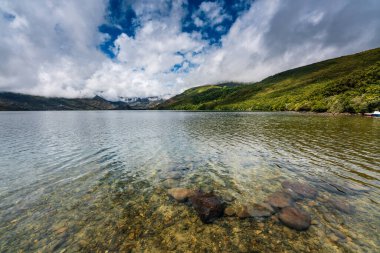 Calm and transparent waters in Lake Sanabria, the largest natural lake on the Iberian peninsula and the largest lake of glacial origin in Europe It is located in Zamora province, Castilla y Len clipart