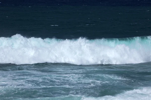 Golven en stenen op Gris Gris strand — Stockfoto