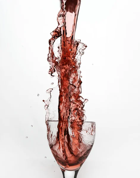 Vinho tinto derramando — Fotografia de Stock