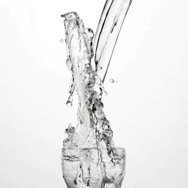 Water splash in glass — Stock Photo, Image