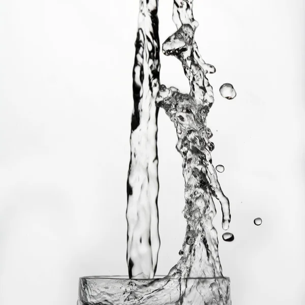 Water splash in glass — Stock Photo, Image