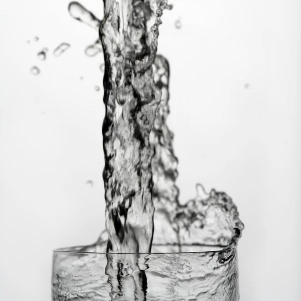 Water splash in glass — Stock Photo, Image