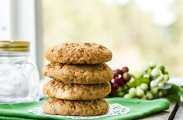 Homemade cookies on the table, colored tea cups — Stock Photo, Image