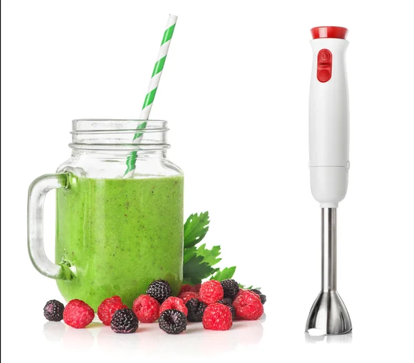 Green smoothies in a glass jar and Immersion blender — Stock Photo, Image