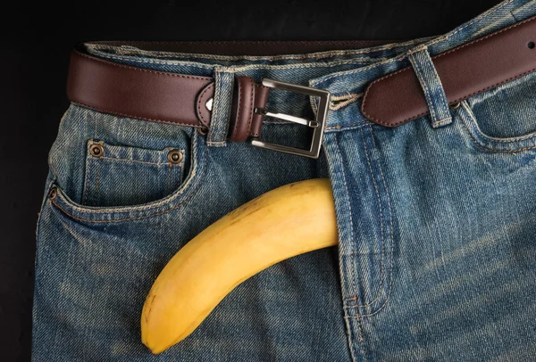 Big Banana and mens jeans, like the penis — Stockfoto