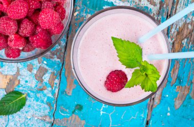  fresh delicious milkshake with fresh ripe raspberries